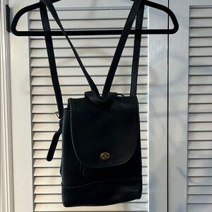 Coach Black Backpack with Flap Closure and Metal Detail